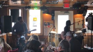 March 25, 2018: Patrons at Jesse Oaks enjoy an afternoon of reggae with local favorites Vibration Foundation